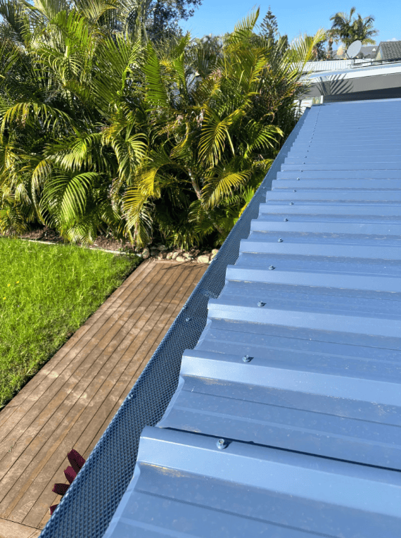 A Close up of a Roof with Gutters — Norwest Roof Restorations In Blue Bay, NSW